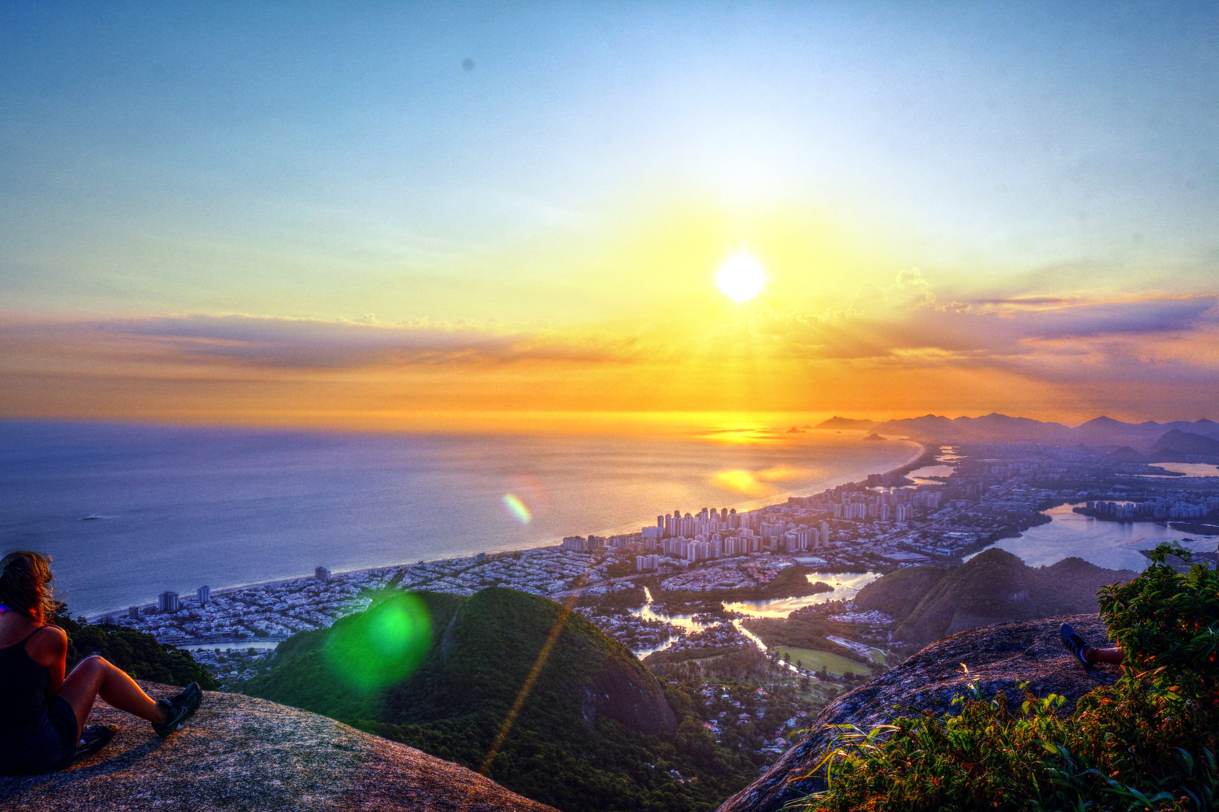 Sunset from Pedra Bonita — the long sweep of Barra da Tijuca unfolding west of Joá.