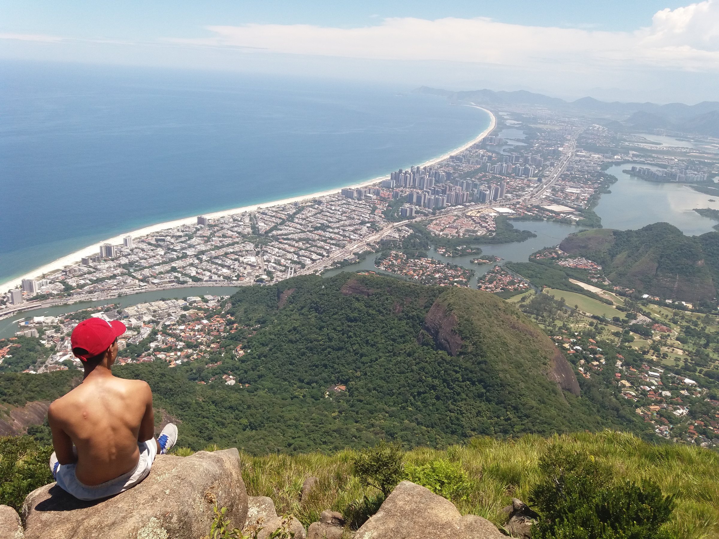 Pedra da Gávea from the Barra side, its flat summit and sheer face unmistakable on the skyline.